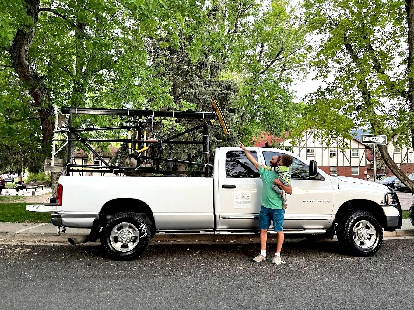 Full Services work truck with lumber rack parked in Boulder